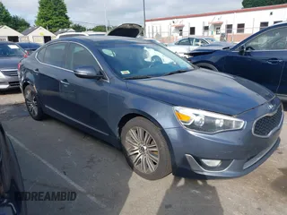 2015 Kia Cadenza Premium z VIN KNALN4D75F5174460, wystawiony jako IAAI lot #42521576 z przebiegiem 172 375 mil mil oraz . Historia ofert i sprzedaży dostępna na DreamBid. Obrazek 1.