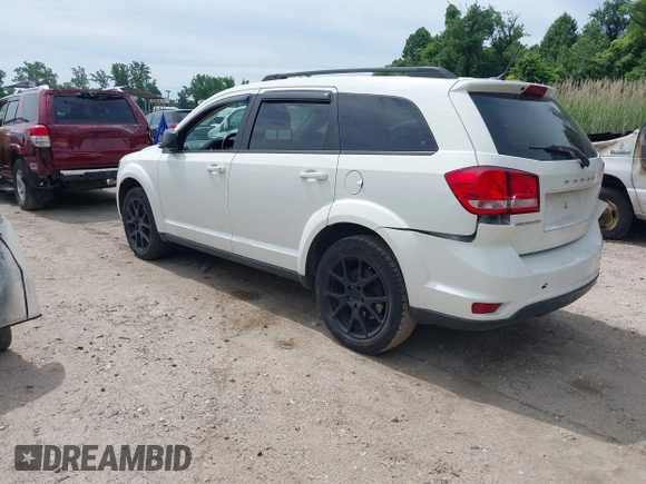 2014 Dodge Journey SXT z VIN 3C4PDCBBXET135001, wystawiony jako IAAI lot #42318360 z przebiegiem 152 321 mil mil oraz . Historia ofert i sprzedaży dostępna na DreamBid. Obrazek 3.