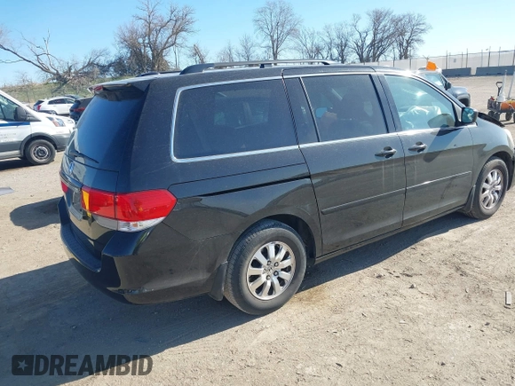 2010 Honda Odyssey EX-L with VIN 5FNRL3H67AB063205, listed as a IAAI auction lot 41996537 with 146,327 mi miles and . Bid and sale history available at DreamBid. Image 4.