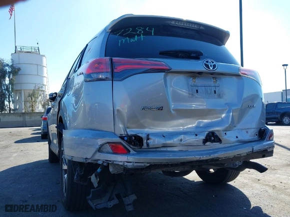 2018 Toyota RAV4 XLE with VIN 2T3WFREV7JW408039, listed as a IAAI auction lot 41686372 with 94,125 mi miles. Bid and sale history available at carsss.com. Image 6.