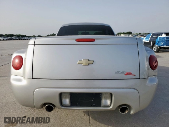 2005 Chevrolet SSR LS z VIN 1GCES14H75B114899, wystawiony jako Copart lot #56712515 z przebiegiem 99 359 mil mil oraz Szkoda całkowita • Salvage title. Historia ofert i sprzedaży dostępna na DreamBid. Obrazek 6.