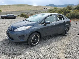 2011 Ford Fiesta S with VIN 3FADP4AJ7BM240146, listed as a Copart auction lot 60495535 with 65,549 mi miles and Salvage title. Bid and sale history available at DreamBid. Image 1.