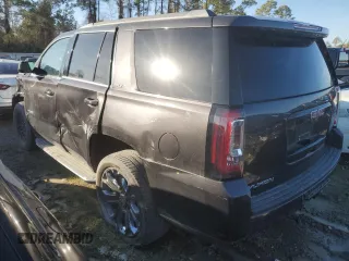 2015 GMC Yukon SLT with VIN 1GKS1BKC0FR239629, listed as a Copart auction lot 42247555 with 171,641 mi miles and Salvage Title. Bid and sale history available at carsss.com. Image 2.