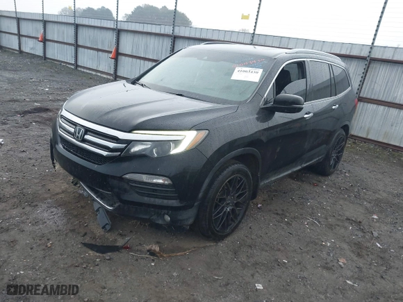 2017 Honda Pilot Touring with VIN 5FNYF5H9XHB014096, listed as a IAAI auction lot 41003430 with 168,120 mi miles. Bid and sale history available at carsss.com. Image 18.
