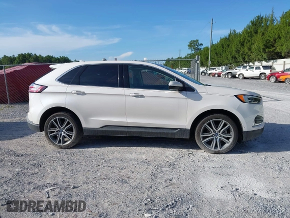 2019 Ford Edge Titanium with VIN 2FMPK3K95KBB34764, listed as a IAAI auction lot 42719541 with 128,028 mi miles and . Bid and sale history available at DreamBid. Image 13.