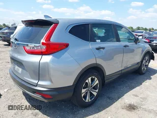 2019 Honda CR-V LX with VIN 2HKRW5H31KH411771, listed as a IAAI auction lot 42060193 with 175,036 mi miles and . Bid and sale history available at DreamBid. Image 4.