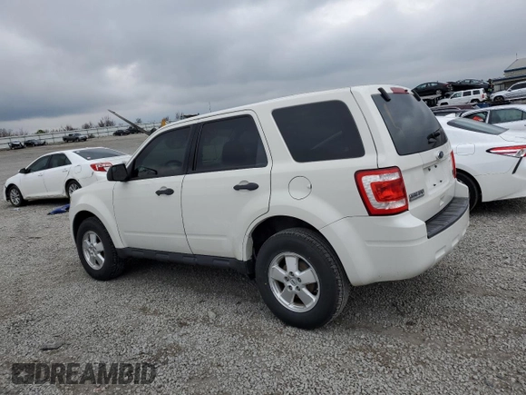 2011 Ford Escape XLS with VIN 1FMCU0C71BKB89898, listed as a Copart auction lot 52240445 with 180,201 mi miles and Salvage title. Bid and sale history available at DreamBid. Image 2.