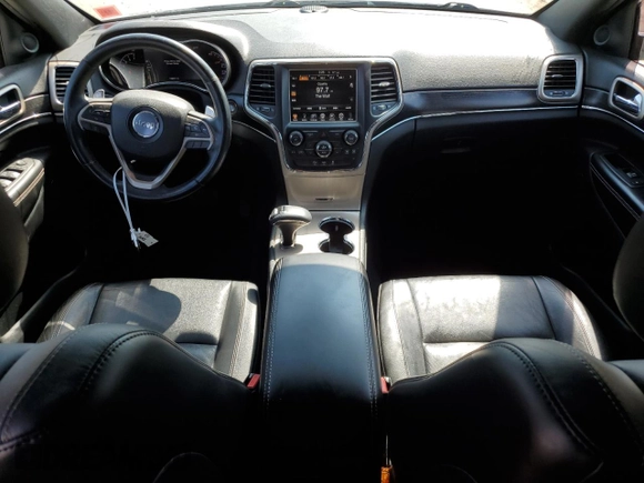 2014 Jeep Grand Cherokee Limited with VIN 1C4RJFBG2EC121152, listed as a Copart auction lot 68676144 with 145,891 mi miles and Salvage title. Bid and sale history available at DreamBid. Image 8.