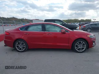 2020 Ford Fusion Hybrid Titanium with VIN 3FA6P0RU7LR156915, listed as a IAAI auction lot 40738652 with 82,836 mi miles. Bid and sale history available at carsss.com. Image 14.
