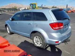 2013 Dodge Journey SXT with VIN 3C4PDCBG4DT584135, listed as a IAAI auction lot 41902149 with 165,700 mi miles and . Bid and sale history available at carsss.com. Image 3.