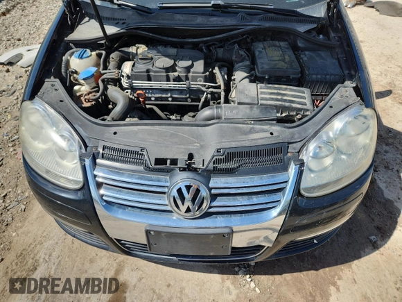 2006 Volkswagen Jetta 1.9L TDI z VIN 3VWDT71K46M043065, wystawiony jako Copart lot #62080885 z przebiegiem 279 917 mil mil oraz Nie do naprawy • Non repairable. Historia ofert i sprzedaży dostępna na DreamBid. Obrazek 11.