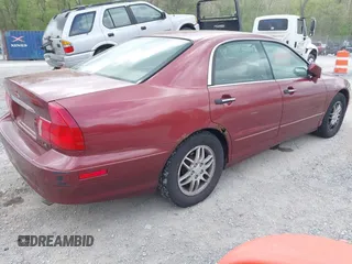 2000 Mitsubishi Diamante LS z VIN 6MMAP67P4YT003358, wystawiony jako IAAI lot #42112046 z przebiegiem 266 341 mil mil oraz . Historia ofert i sprzedaży dostępna na DreamBid. Obrazek 4.