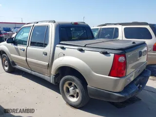 2005 Ford Explorer Sport Trac XLS with VIN 1FMZU67K75UB60359, listed as a IAAI auction lot 41805854 with 174,352 mi miles. Bid and sale history available at carsss.com. Image 3.