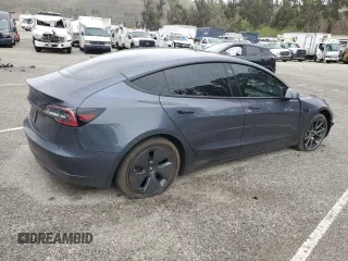 2023 Tesla Model 3 with VIN 5YJ3E1EA9PF543672, listed as a Copart auction lot 48211035 with Not Provided miles and Salvage Title. Bid and sale history available at DreamBid. Image 3.