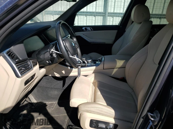 2020 BMW X5 xDrive40i with VIN 5UXCR6C06LLL75359, listed as a Copart auction lot 60897885 with 66,631 mi miles and Salvage title. Bid and sale history available at DreamBid. Image 7.