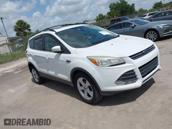 2013 Ford Escape SE with VIN 1FMCU0GX5DUA85464, listed as a IAAI auction lot 42452112 with 158,081 mi miles and . Bid and sale history available at DreamBid. Image 1.