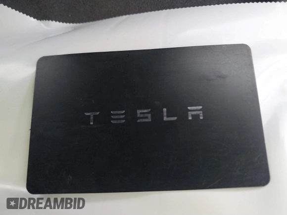 2023 Tesla Model 3 with VIN 5YJ3E1EA0PF518983, listed as a IAAI auction lot 41749225 with 26,748 mi miles and . Bid and sale history available at DreamBid. Image 11.