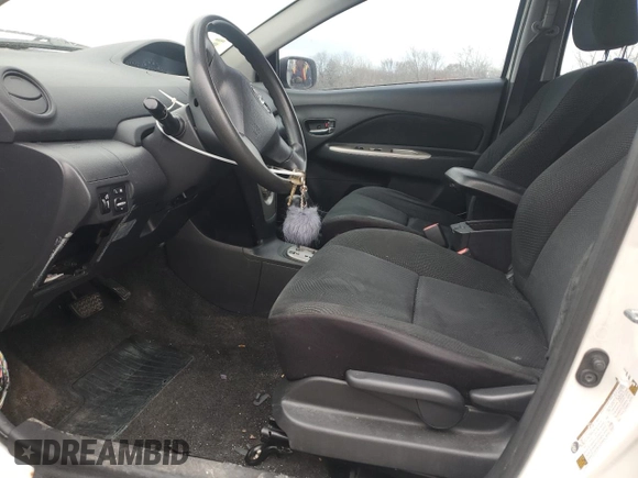 2009 Toyota Yaris with VIN JTDBT903991338082, listed as a Copart auction lot 51156955 with 328,941 mi miles and Salvage Title. Bid and sale history available at carsss.com. Image 7.