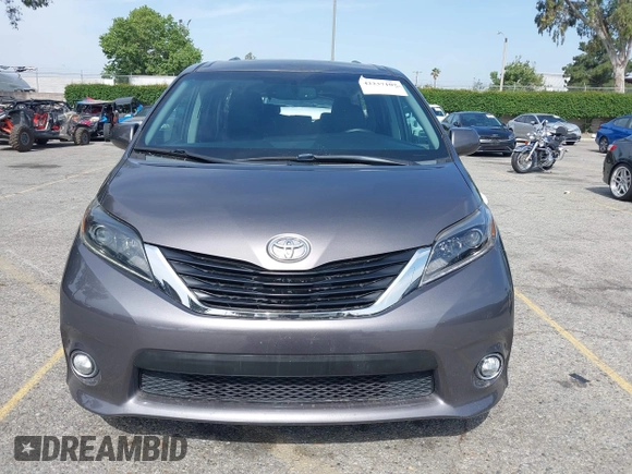2015 Toyota Sienna SE with VIN 5TDXK3DCXFS680767, listed as a IAAI auction lot 42237107 with 105,912 mi miles and . Bid and sale history available at DreamBid. Image 13.