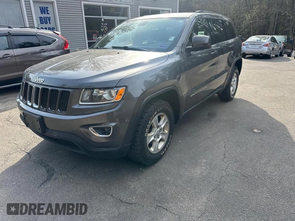 2014 Jeep Grand Cherokee Laredo with VIN 1C4RJFAG3EC457703, listed as a Copart auction lot 56620815 with 200,144 mi miles and Clean Title. Bid and sale history available at DreamBid. Image 2.