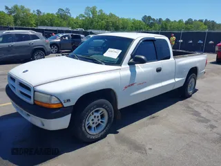 1999 Dodge Dakota SLT z VIN 1B7GL22X0XS193423, wystawiony jako IAAI lot #42053562 z przebiegiem 209 802 mil mil oraz . Historia ofert i sprzedaży dostępna na DreamBid. Obrazek 17.