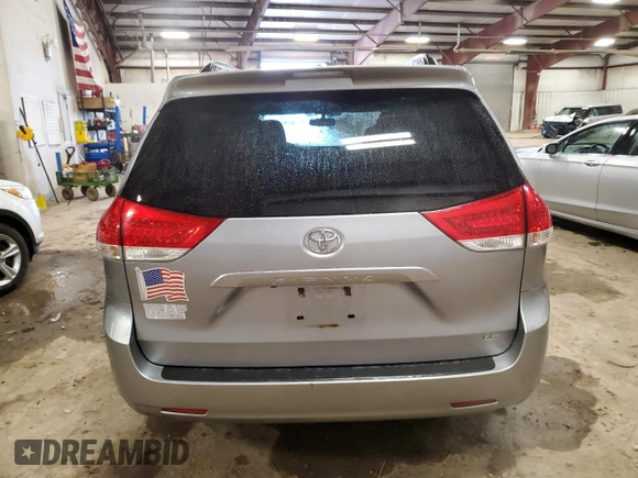 2012 Toyota Sienna LE AAS с VIN 5TDKK3DC6CS180529, выставлен на аукционе Copart как лот 55704195 с пробегом 140 470 миль миль и Чистый • Clean title. История ставок и продаж доступна на DreamBid. Изображение 6.