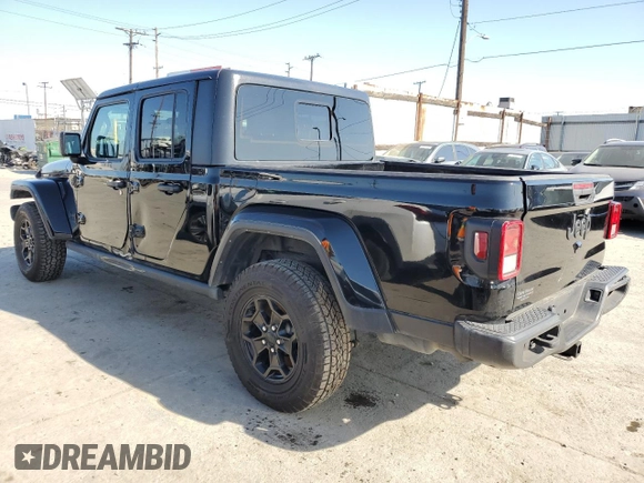 2021 Jeep Gladiator Willys with VIN 1C6HJTAG8ML563161, listed as a Copart auction lot 52734195 with 48,521 mi miles and Salvage title. Bid and sale history available at DreamBid. Image 2.