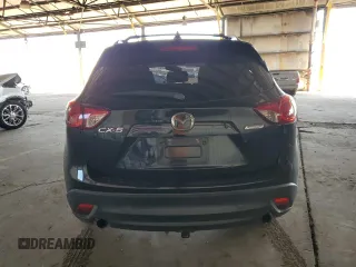 2014 Mazda CX-5 Touring with VIN JM3KE2CY4E0379574, listed as a Copart auction lot 48509655 with 178,102 mi miles and Salvage Title. Bid and sale history available at DreamBid. Image 6.