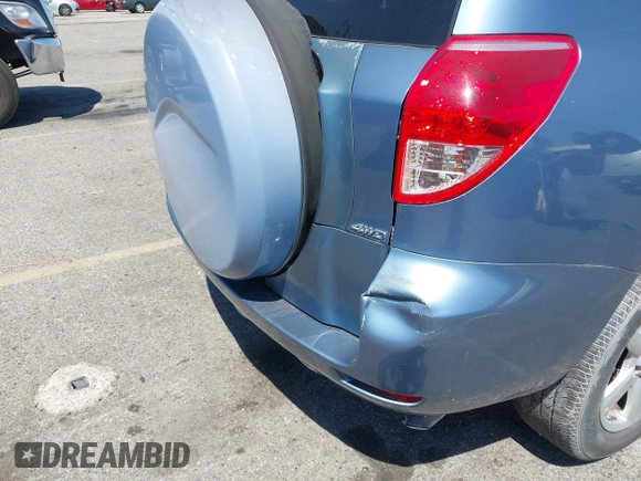 2007 Toyota RAV4 with VIN JTMBD33V975075248, listed as a IAAI auction lot 42020567 with 155,228 mi miles. Bid and sale history available at carsss.com. Image 6.
