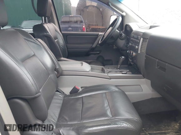 2004 Nissan Titan LE with VIN 1N6AA07B24N579345, listed as a IAAI auction lot 42174006 with 142,780 mi miles and . Bid and sale history available at DreamBid. Image 5.