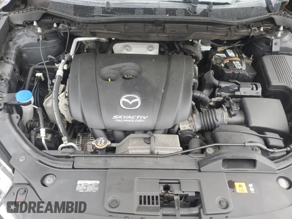 2016 Mazda CX-5 Grand Touring with VIN JM3KE4DYXG0711367, listed as a Copart auction lot 52862405 with 87,870 mi miles and Salvage Title. Bid and sale history available at DreamBid. Image 11.