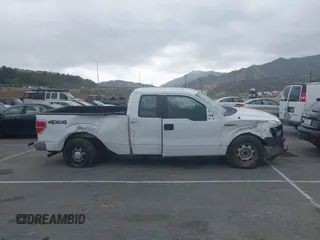 2014 Ford F-150 XL with VIN 1FTFX1CF3EKF95627, listed as a IAAI auction lot 42042775 with 208,405 mi miles and . Bid and sale history available at DreamBid. Image 13.
