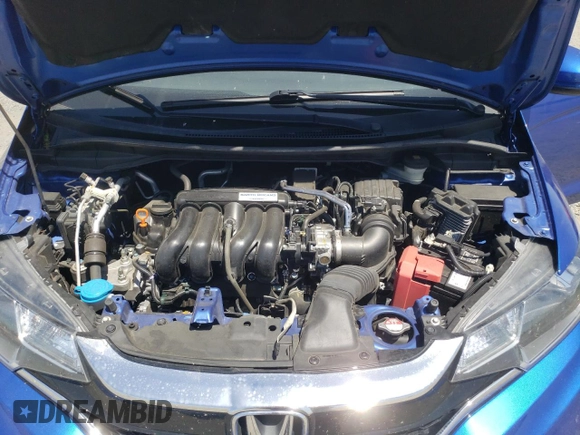 2020 Honda Fit LX z VIN 3HGGK5H43LM715970, wystawiony jako Copart lot #58864625 z przebiegiem 70 351 mil mil oraz Szkoda całkowita • Salvage title. Historia ofert i sprzedaży dostępna na DreamBid. Obrazek 11.