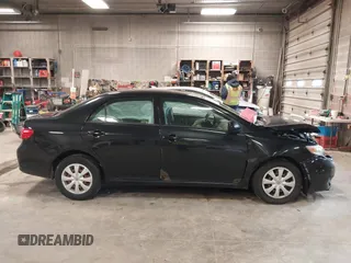 2009 Toyota Corolla with VIN 1NXBU40E29Z133733, listed as a IAAI auction lot 42093904 with 229,509 mi miles. Bid and sale history available at carsss.com. Image 13.