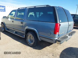 1994 GMC Suburban with VIN 1GKEC16K2RJ721119, listed as a IAAI auction lot 41075175 with 344,904 mi miles. Bid and sale history available at carsss.com. Image 3.