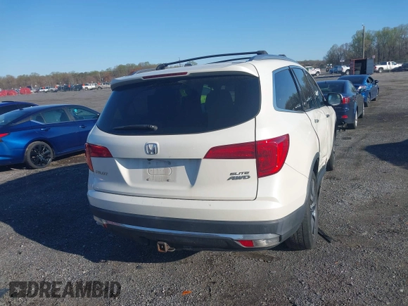 2017 Honda Pilot Elite with VIN 5FNYF6H00HB032386, listed as a IAAI auction lot 41976702 with 153,251 mi miles and . Bid and sale history available at DreamBid. Image 16.