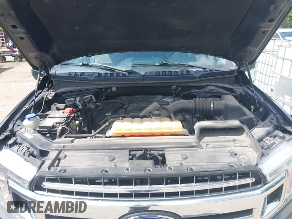 2018 Ford F-150 XL with VIN 1FTEW1E57JFA95086, listed as a IAAI auction lot 42574704 with 77,301 mi miles and . Bid and sale history available at DreamBid. Image 10.