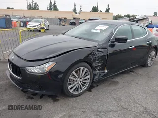 2015 Maserati Ghibli z VIN ZAM57XSA4F1151843, wystawiony jako IAAI lot #38392898 z przebiegiem 88 147 mil mil oraz . Historia ofert i sprzedaży dostępna na DreamBid. Obrazek 17.