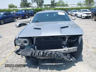 2015 Dodge Challenger SXT Plus z VIN 2C3CDZBG0FH715823, wystawiony jako IAAI lot #42354845 z przebiegiem 130 879 mil mil oraz . Historia ofert i sprzedaży dostępna na DreamBid. Obrazek 13.