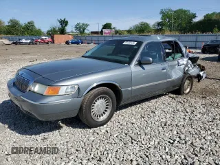 1999 Mercury Grand Marquis LS z VIN 2MEFM75W6XX645735, wystawiony jako Copart lot #56426135 z przebiegiem 103 002 mil mil oraz Szkoda całkowita • Salvage title. Historia ofert i sprzedaży dostępna na DreamBid. Obrazek 1.