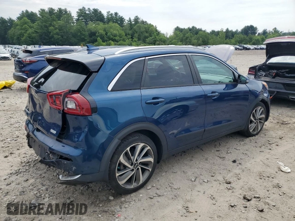 2019 Kia Niro Touring with VIN KNDCE3LCXK5345712, listed as a Copart auction lot 61921284 with 57,903 mi miles and Salvage Title. Bid and sale history available at carsss.com. Image 3.