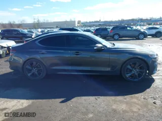 2023 Genesis G70 2.0T with VIN KMTG34TA9PU109174, listed as a IAAI auction lot 41582887 with 72,996 mi miles. Bid and sale history available at carsss.com. Image 13.