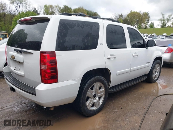 2007 Chevrolet Tahoe LT z VIN 1GNFC13J37R113756, wystawiony jako IAAI lot #42021634 z przebiegiem 247 631 mil mil oraz . Historia ofert i sprzedaży dostępna na DreamBid. Obrazek 4.