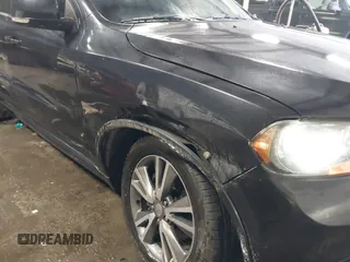 2013 Dodge Durango R/T z VIN 1C4SDJCT2DC662269, wystawiony jako IAAI lot #41602661 z przebiegiem 180 014 mil mil oraz . Historia ofert i sprzedaży dostępna na DreamBid. Obrazek 6.