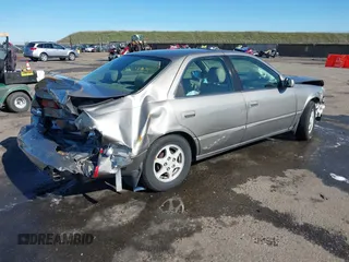 1998 Toyota Camry LE z VIN 4T1BG28KXWU248887, wystawiony jako IAAI lot #41507392 z przebiegiem Nie podano mil oraz . Historia ofert i sprzedaży dostępna na DreamBid. Obrazek 4.