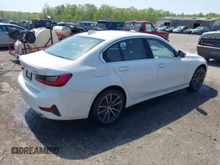 2019 BMW 3 Series 330i xDrive with VIN WBA5R7C54KAJ79214, listed as a IAAI auction lot 42001361 with 103,265 mi miles. Bid and sale history available at carsss.com. Image 4.