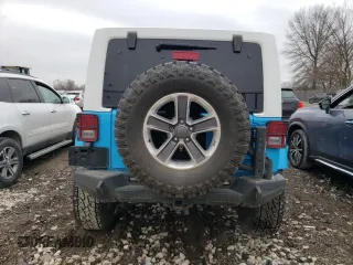 2017 Jeep Wrangler Unlimited Sahara with VIN 1C4BJWEG3HL631057, listed as a Copart auction lot 48070355 with 88,477 mi miles and Salvage title. Bid and sale history available at DreamBid. Image 6.