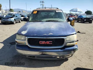 2001 GMC Yukon SLT z VIN 1GKEC13T21J264040, wystawiony jako Copart lot #46282145 z przebiegiem 136 264 mil mil oraz Szkoda całkowita • Salvage title. Historia ofert i sprzedaży dostępna na DreamBid. Obrazek 5.
