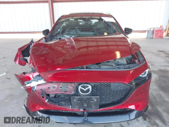 2021 Mazda 3 Premium Plus z VIN JM1BPBNY3M1332643, wystawiony jako IAAI lot #41536777 z przebiegiem 43 075 mil mil oraz . Historia ofert i sprzedaży dostępna na DreamBid. Obrazek 12.