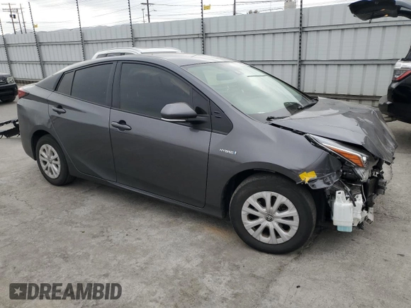 2021 Toyota Prius L Eco with VIN JTDKAMFU8M3130779, listed as a Copart auction lot 56452395 with 86,094 mi miles and Salvage title. Bid and sale history available at DreamBid. Image 4.